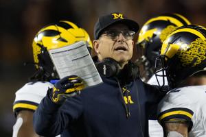 No. 2 Michigan suspends staffer after allegations of sign-stealing
