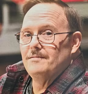 Michael E. Manchester